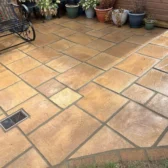 New sandstone patio slabs laid Woking