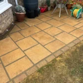 Sandstone patio paving with block edging Woking